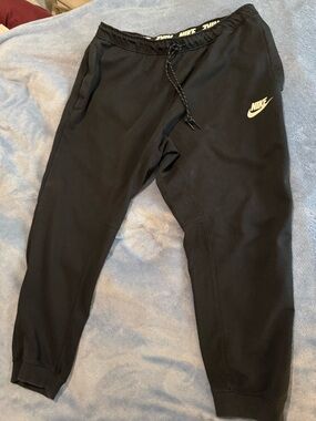 Nike Black Jogger Sweatpants with White Swoosh